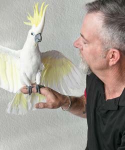 Shelter Employee with Bird